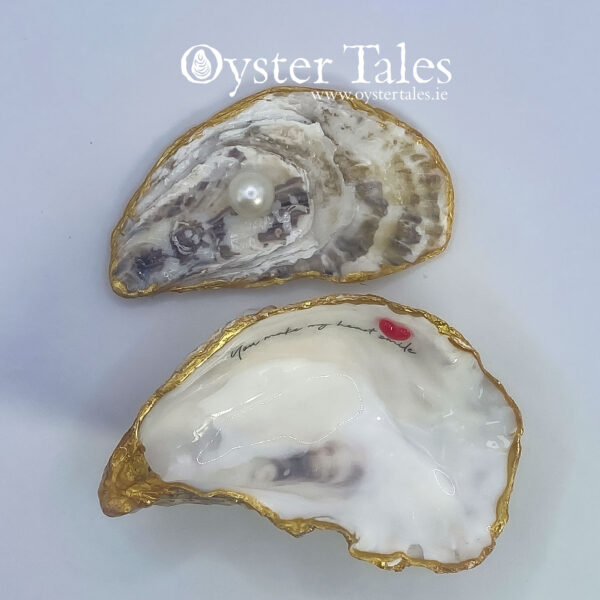 a genuine oyster shell sourced along the iconic Wild Atlantic Way, each piece carries the raw, natural beauty of the Irish shore—no two are ever the same