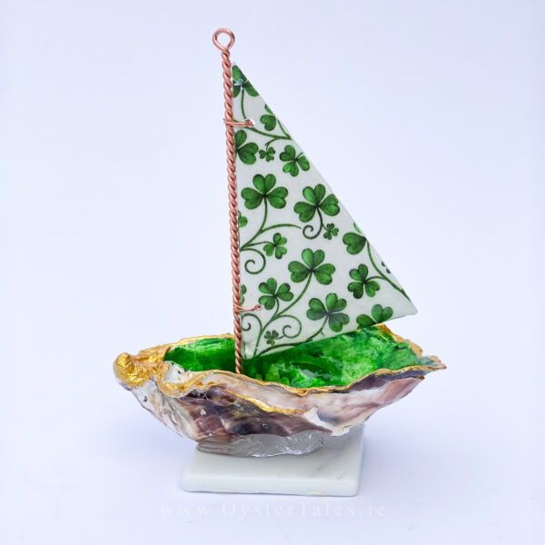 Real Galway Bay oyster sailing boat ornament with shamrock sail.