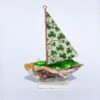 Oyster shell sailing boat.