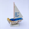 Trust the wind, enjoy the journey. Oyster shell sailing boat.